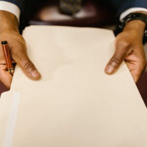 Close-Up of a Person Serving child arrangement Papers
