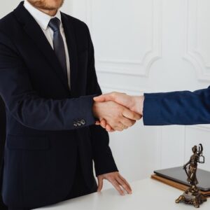 Shake of Two Men representing what to look for in a divorce lawyer
