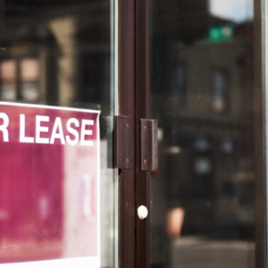 for lease sign at the front of a building to show the key steps to leasing a commercial property