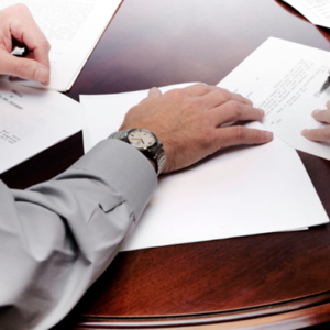 an elderly couple writing their will to show what rights you have if you're left out of your parent's will, lawyer for will writing, will advice, wills, trusts law firm, trusts lawyer, executor of will