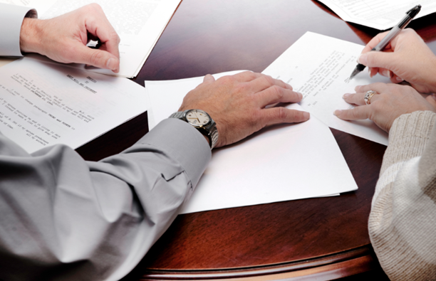 What Rights Do I Have If My Parents Leave Me Out Of Their Will? 1 an elderly couple writing their will to show what rights you have if you're left out your parent's will
